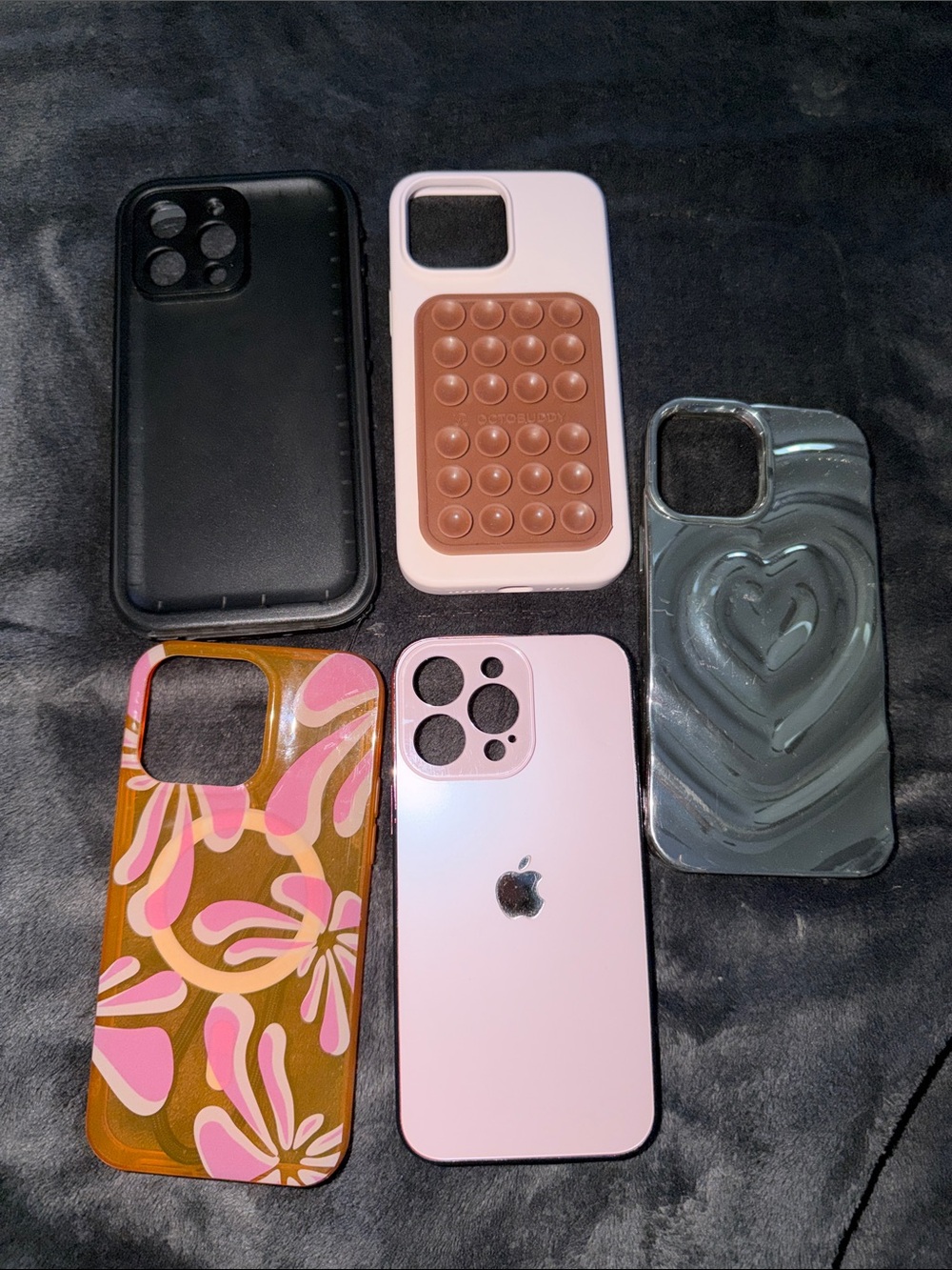 Apple iPhone 14 Pro Max Pink with Assorted Pink and Brown Cases